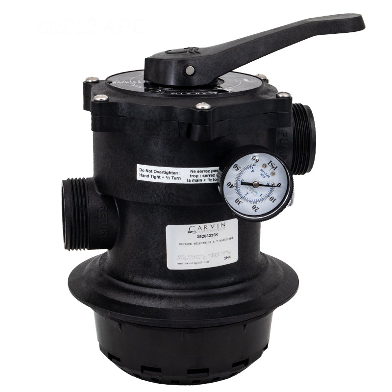 Close-up of Carvin DVK7C Multiport Valve showing the installed pressure gauge, Carvin 39263035K product label, and plumbing ports.