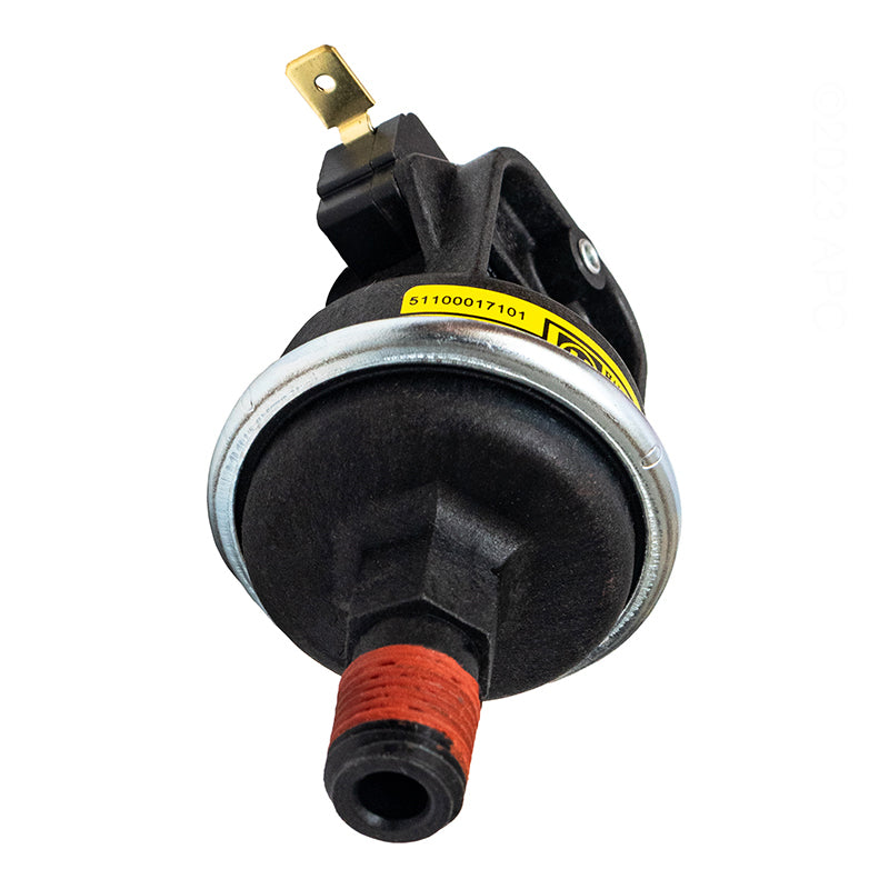 Close-up view of the bottom threads and yellow caution tag on the pre-installed pressure switch included with the Hayward FDXLHXA1250 H250FD heat exchanger.
