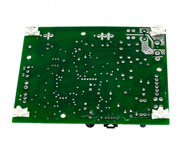 Rear view of Hayward HDXFICBRD001 Ignition Control Board showing solder points and mounting bracket clips