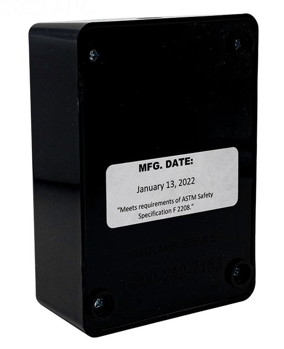 Rear view of the PoolGuard PGRM2 sensor unit showing the ASTM F 2208 safety specification compliance and manufacturing date label.