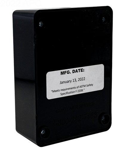 Rear view of the PoolGuard PGRM2 sensor unit showing the ASTM F 2208 safety specification compliance and manufacturing date label.