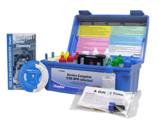 Taylor K-2006C commercial pool test kit open showing large 2oz reagent bottles and heavy-duty blue carrying case.